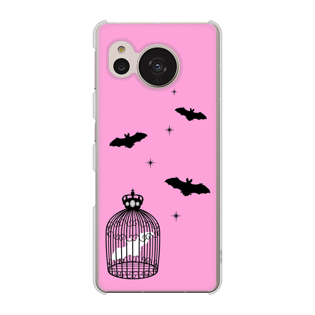 AQUOS sense7 SHG10 au 高画質仕上げ 背面印刷 ハードケース【AG808 こうもりの王冠鳥かご(ピンク×黒)】